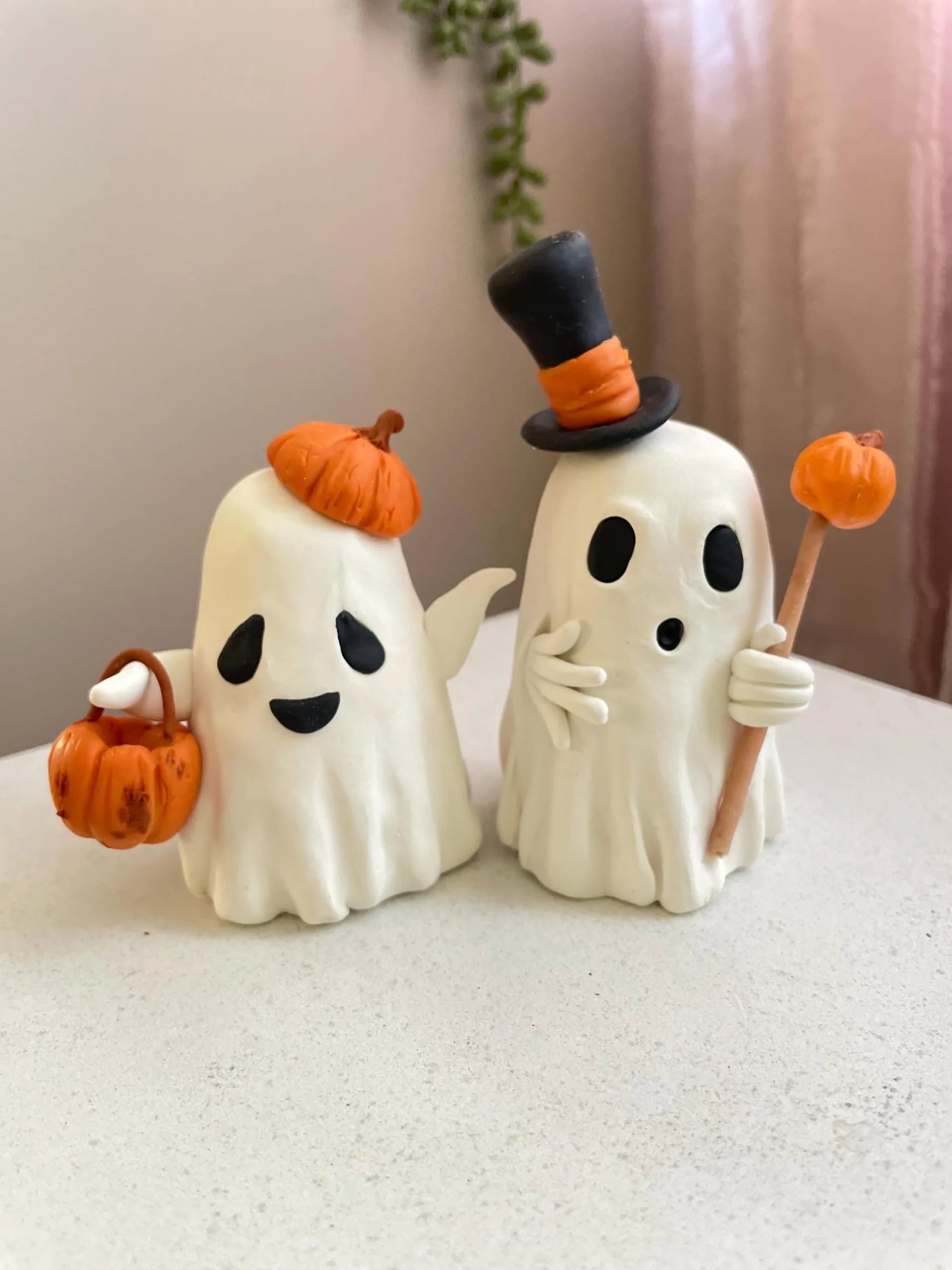 Cute ghost decor idea 5: Pair a Top-Hat Ghost Couple on the Entry Table