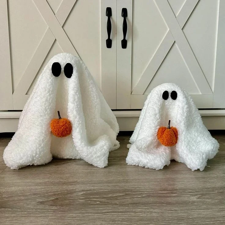 Cute ghost decor idea 11: Sit Plush Towel Ghosts by the Front Door