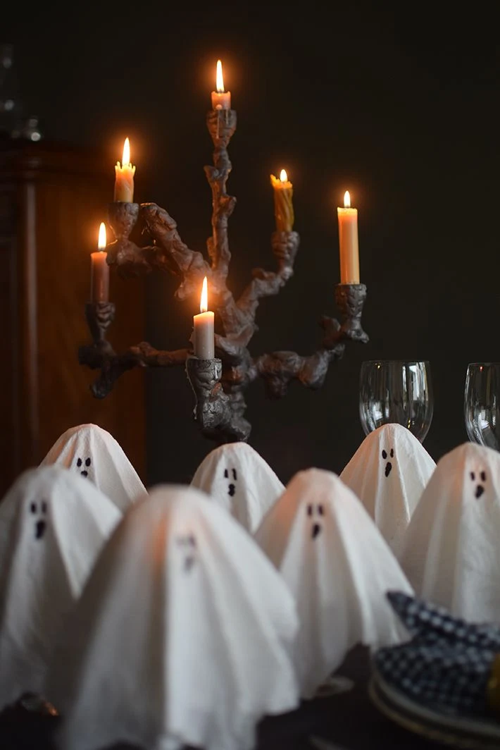 Cute ghost decor idea 22: Dress Chairs in Sheet Ghost Covers