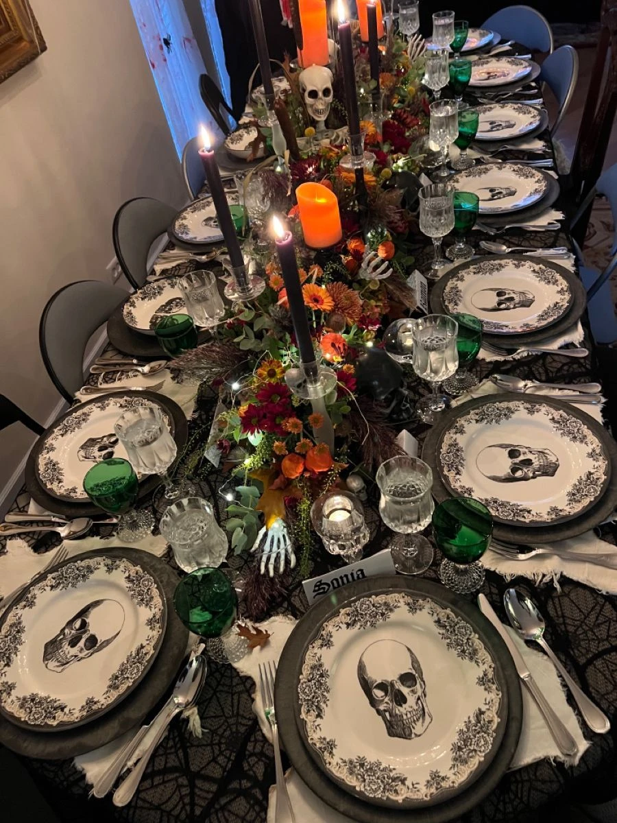 Halloween tablescape idea 3: Stretch a Candlelit Runner Down a Long Table