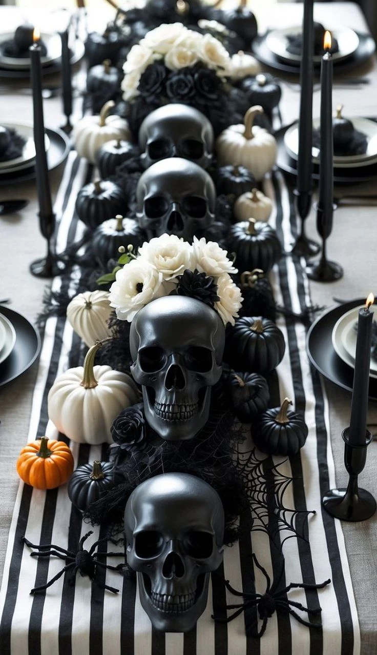 Halloween tablescape idea 6: Run a Bold Striped Runner Under a Line of Skulls