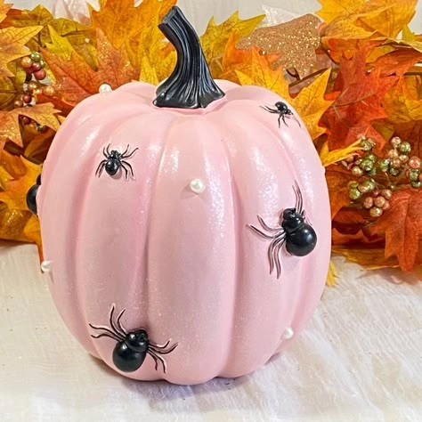 Pink Halloween decor idea 8: Dot a Pink Pumpkin With Tiny Spiders