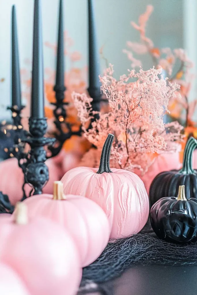 Pink Halloween decor idea 16: Pair Pink Pumpkins With Tall Black Candles