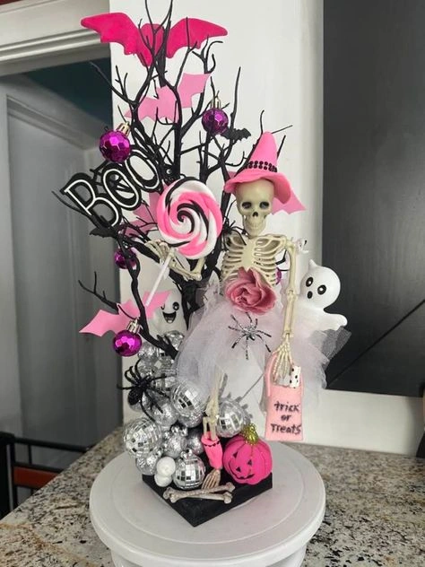 Pink Halloween decor idea 18: Build a Skeleton Witch Centerpiece