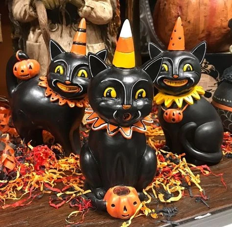 Vintage Halloween decor idea 3: Perch Vintage Black Cat Figurines in Party Hats