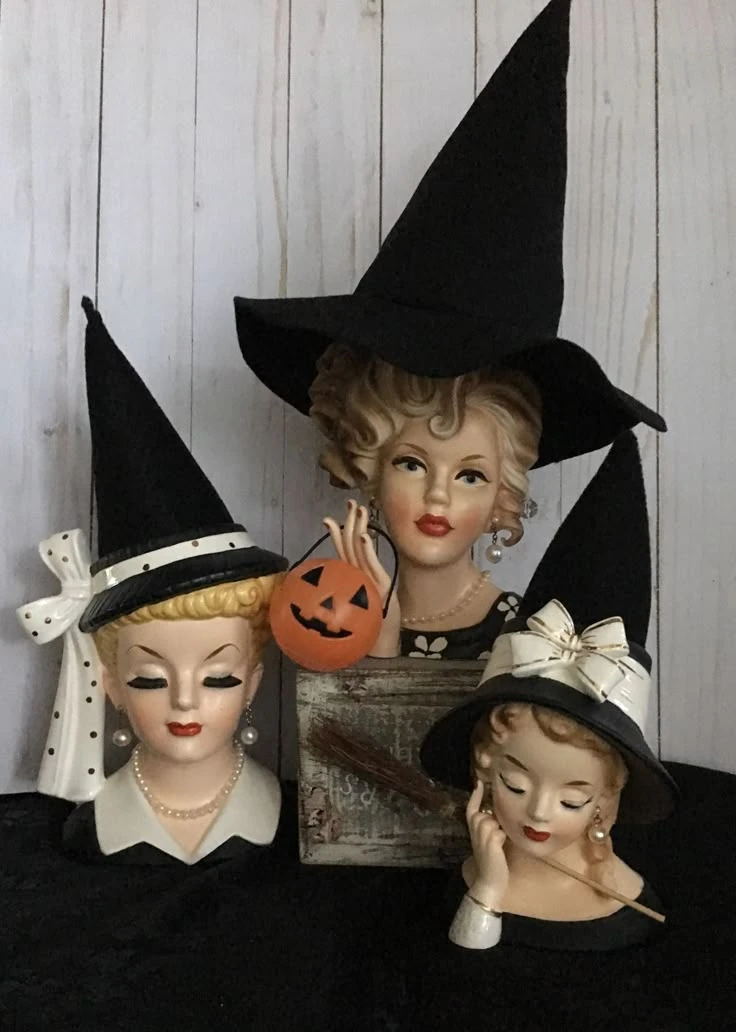 Vintage Halloween decor idea 4: Top Mannequin Heads With Tall Vintage Witch Hats