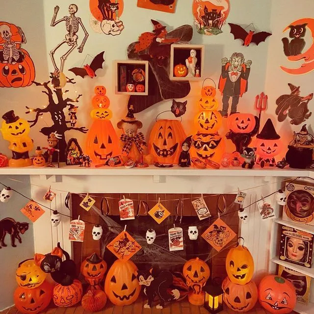 Vintage Halloween decor idea 6: Dress the Mantel With Retro Die-Cuts and Card Garlands