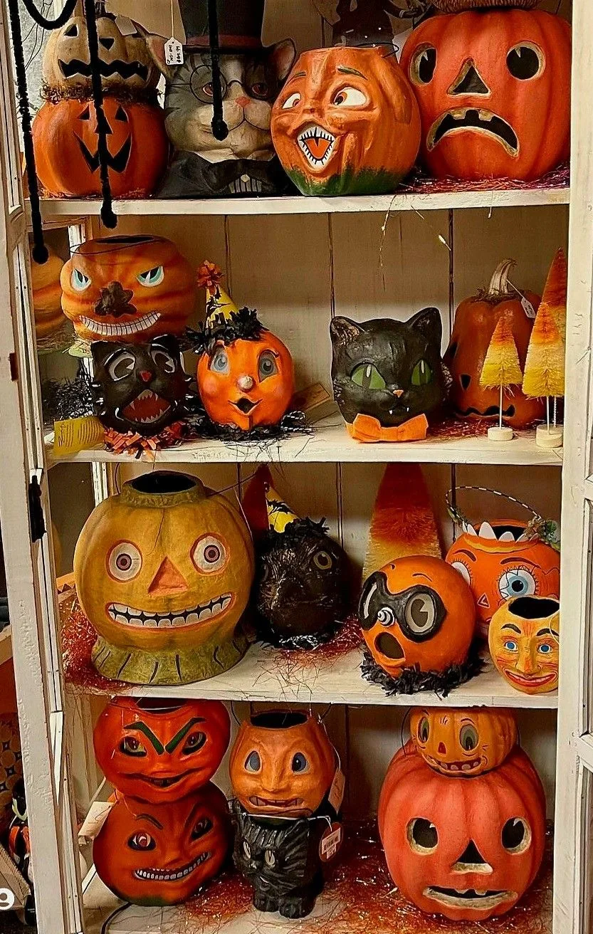 Vintage Halloween decor idea 7: Curate a Pumpkin-Face Hutch, One Grin Per Shelf