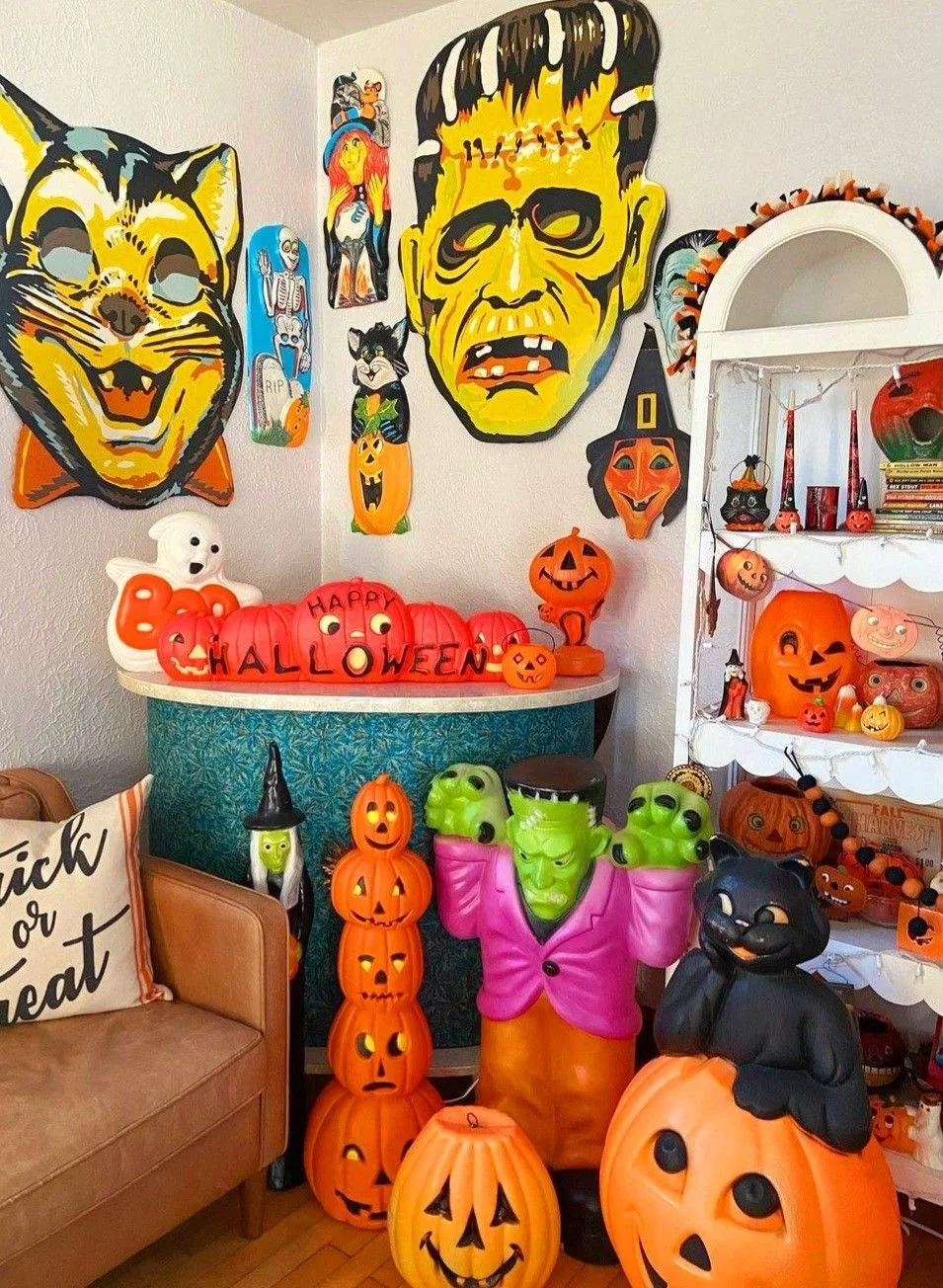 Vintage Halloween decor idea 11: Lean Into 1950s Blow Molds and Paper Masks