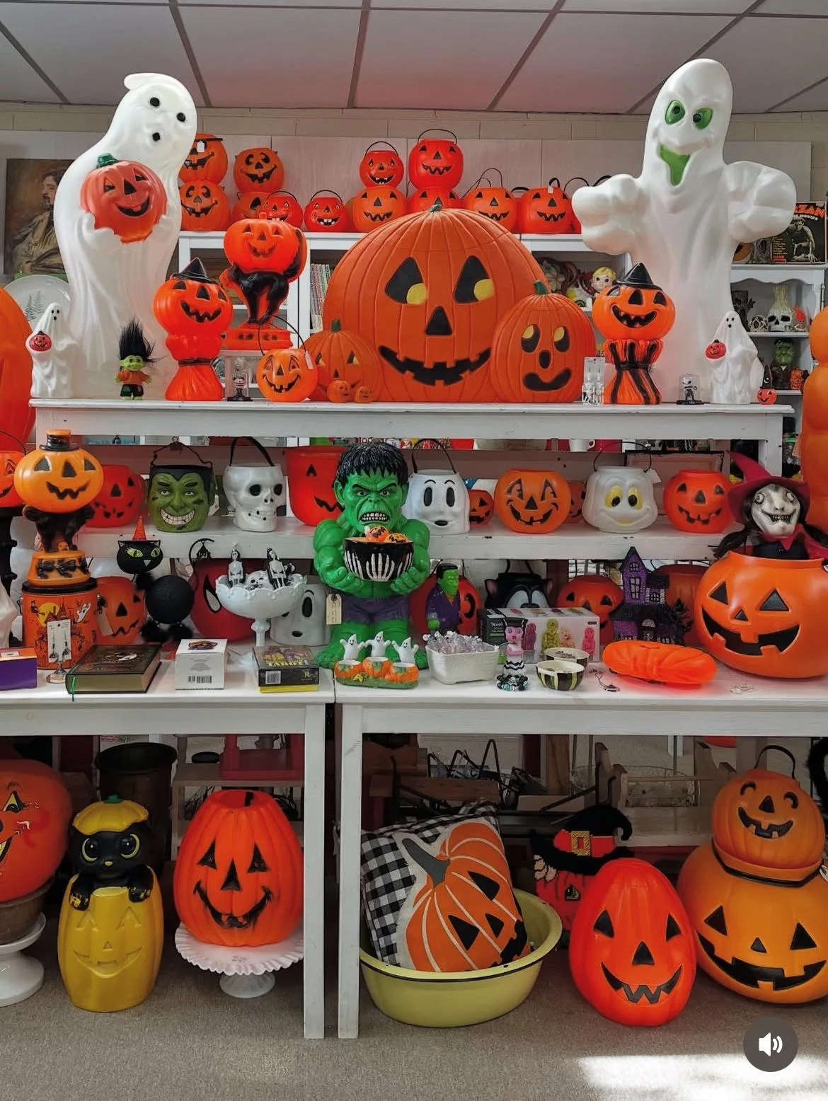 Vintage Halloween decor idea 12: Let Blow Molds Glow on White Shelves