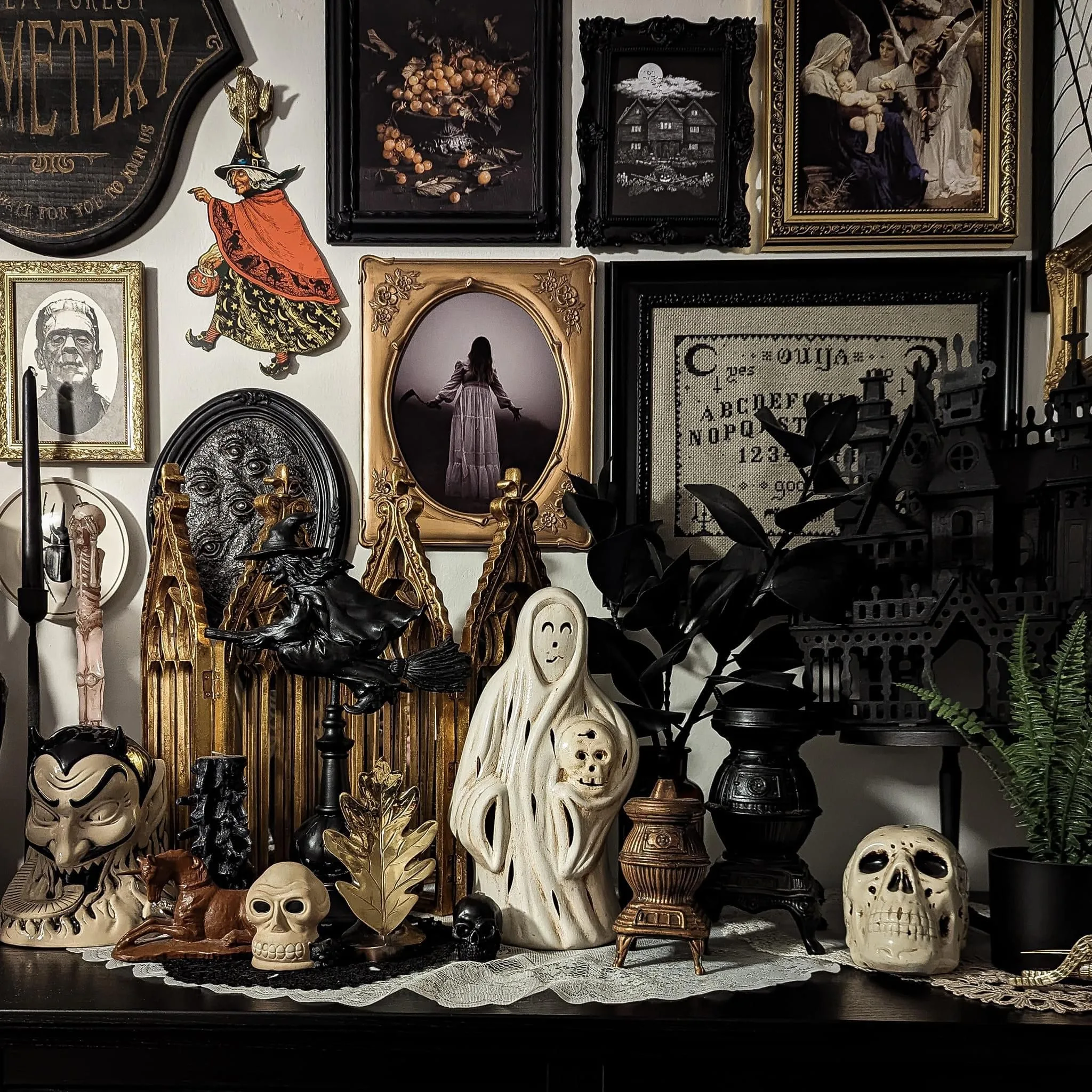 Vintage Halloween decor idea 16: Hang a Spooky Gallery Wall of Vintage Prints